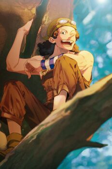 1boy absurdres bare_shoulders black_hair blurry blurry_background blurry_foreground brown_overalls brown_pants commentary goggles goggles_on_headwear hat highres in_tree lips long_nose looking_at_viewer male_focus medium_hair one_piece oophytoncideoo open_mouth overalls pants sitting sitting_in_tree solo sunlight tree usopp