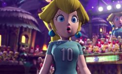 1girl 3d animated bad_tag blonde_hair blue_earrings blue_eyes breasts breathing_(animated) cutscene earrings heavy_breathing jewelry koopa_troopa large_earrings lipstick makeup mario_(series) mario_strikers:_battle_league mario_strikers_(series) nintendo official_art princess_peach shirt shy_guy soccer_uniform sportswear t-shirt tagme toad_(mario) video video_game_screencap yoshi