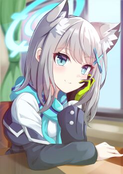 1girl absurdres animal_ear_fluff black_jacket blue_archive blue_eyes blue_halo blue_scarf blurry blurry_background blush bright_pupils classroom closed_mouth commentary crescent crescent_hair_ornament extra_ears gloves green_gloves grey_hair hair_between_eyes hair_ornament halo happy highres indoors jacket long_sleeves looking_at_viewer medium_hair mismatched_pupils nanoty scarf school_uniform shiroko_(blue_archive) shirt single_glove sitting slit_pupils smile solo split_mouth upper_body white_pupils white_shirt