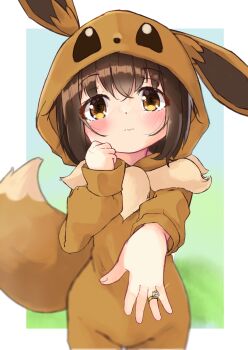 1girl absurdres black_hair blurry blurry_background blush brown_eyes commentary_request cosplay depth_of_field eevee eevee_(cosplay) eevee_ears eevee_tail gen_1_pokemon groin hair_between_eyes highres hood hood_up jewelry long_sleeves looking_at_viewer manabe_mana nintendo outstretched_arm parted_lips poke_kid_(pokemon) pokemon pokemon_swsh puffy_long_sleeves puffy_sleeves ring solo standing