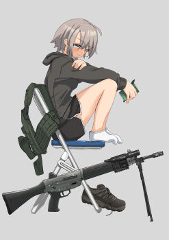 1girl absurdres ammunition_pouch assault_rifle bipod boots breasts brown_boots bulletproof_vest chair closed_mouth commentary_request fingernails flashlight folding_chair from_side full_body green_hoodie green_shorts grey_background grey_eyes grey_hair gun highres holding holding_notepad holding_own_arm holding_pen hood hood_down hoodie howa_type_89 legs looking_at_another looking_to_the_side medium_breasts notepad okapi_(yomaigoto) original pen pouch rifle shoes short_hair shorts sidelocks simple_background sitting socks solo thighs unworn_shoes unworn_vest vest weapon white_socks
