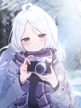 1girl absurdres ahoge alternate_costume black_sweater blue_archive blurry blurry_background blush camera commentary demon_girl demon_horns depth_of_field grey_jacket grin highres hina_(blue_archive) holding holding_camera horns jacket long_hair looking_at_viewer multiple_horns not_seven777 outdoors parted_bangs plaid_clothes plaid_scarf purple_eyes purple_scarf scarf smile snow solo sweater tree upper_body white_hair