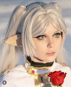 1girl abi_aikou cosplay cosplay_photo female_focus frieren frieren_(cosplay) green_eyes highres parted_bangs photo_(medium) pointy_ears real_life solo sousou_no_frieren twintails white_hair