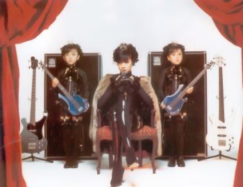 bass_guitar crossdressing gothic_lolita guitar instrument killer lolita_fashion photo_(medium) toshiya trap visual_kei
