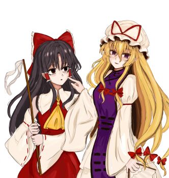 2girls 83mkneinlsqmebq :o absurdres ascot bare_shoulders black_hair blonde_hair bow cheek_poking commentary detached_sleeves dress expressionless gohei hair_between_eyes hair_ribbon hair_tubes hakurei_reimu hat highres holding holding_gohei long_hair long_sleeves looking_at_another looking_at_viewer mob_cap multiple_girls parted_lips poking purple_eyes purple_tabard red_bow red_eyes red_shirt red_skirt ribbon shirt skirt sleeveless sleeveless_shirt smile tabard touhou very_long_hair white_background white_dress yakumo_yukari yellow_ascot