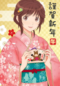 1girl alternate_costume alternate_hairstyle amagami brown_eyes brown_hair checkered_background commentary_request egasumi ema floral_print floral_print_kimono hair_ornament hairclip happy_new_year highres holding japanese_clothes kimono long_sleeves looking_at_viewer nengajou new_year obi open_mouth pink_kimono print_kimono sakurai_rihoko sash short_hair solo takemi_kaoru upper_body wide_sleeves