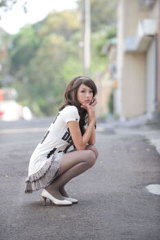 1girl absurdres asian asiangirl5832 brown_hair female_focus full_body headband high_heels highres long_hair looking_at_viewer model outdoors pantyhose photo_(medium) shirt skirt solo white_shirt