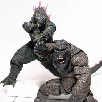 2boys claws dragon_ball dragonball_z father-son_kamehameha figure giant giant_monster godzilla godzilla_(series) godzilla_vs._kong hand_on_another's_neck highres kaiju kamehameha_(dragon_ball) king_kong king_kong_(series) legendary_pictures looking_at_another male_focus monster monsterverse multiple_boys muscular muscular_arms muscular_male muscular_other nipples open_mouth parody pectorals photo_(medium) red_eyes scar scar_on_chest scar_on_stomach teamwork toho trait_connection twitter_logo white_background