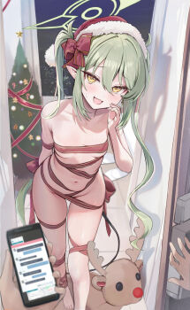 1girl :d blue_archive bow breasts cellphone christmas christmas_tree collarbone commentary_request doorway fang fur-trimmed_headwear fur_trim green_hair green_halo hair_between_eyes halo hat holding holding_phone houraku leaning_forward long_hair looking_at_viewer naked_ribbon navel nozomi_(blue_archive) open_mouth phone pointy_ears pov_doorway red_bow red_hat ribbon santa_hat sensei_(blue_archive) skin_fang small_breasts smartphone smile textless_version twintails yellow_eyes