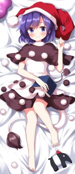 1girl bare_legs barefoot bed_sheet black_capelet black_dress blob blue_eyes blush book capelet closed_mouth commentary_request doremy_sweet dress full_body happy hat highres lying on_back on_bed pom_pom_(clothes) purple_hair red_hat ruu_(tksymkw) short_hair smile solo tail tapir tapir_tail toes touhou white_dress