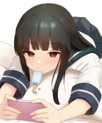Rule 34 | 1girl, black hair, blue sailor collar, blue skirt, blunt bangs, blush, brown eyes, cellphone, food, food in mouth, green sailor collar, hatsuyuki (kancolle), highres, holding, holding phone, kantai collection, long hair, lying, mouth hold, on stomach, phone, pleated skirt, popsicle, sailor collar, sakieko, school uniform, serafuku, short sleeves, sidelocks, simple background, skirt, smartphone, solo, white background