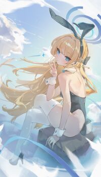 1girl absurdres animal_ears black_leotard black_shoes blonde_hair blue_archive blue_eyes blue_halo commentary fake_animal_ears fake_tail halo high_heels highres leotard long_hair parted_lips playboy_bunny rabbit_ears rabbit_tail shoes solo tail thighhighs toki_(blue_archive) v white_thighhighs wrist_cuffs xue_ni_guai
