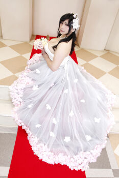 1girl asian black_hair breasts bride chouzuki_maryou cleavage dress highres lipstick makeup photo_(medium) plump solo wedding_dress