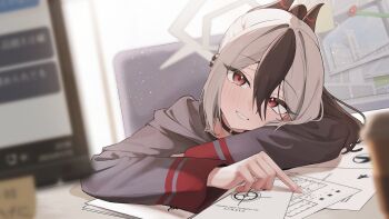 1girl absurdres black_choker black_hair black_hoodie black_horns blue_archive blurry blurry_foreground blush choker commentary_request demon_girl demon_horns depth_of_field desk ear_piercing grey_halo grin hair_between_eyes halo highres hood hood_down hoodie horns indoors kayoko_(blue_archive) long_sleeves looking_at_viewer medium_hair multicolored_hair paper parted_lips piercing ponytail red_eyes revision ryoya sidelocks sitting smile solo two-tone_hair white_hair