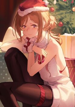 1girl absurdres alternate_costume bare_arms blush box bra breasts brown_hair brown_pantyhose christmas_tree commentary_request dress feet_out_of_frame fur-trimmed_headwear fur_trim fur_wristbands gakuen_idolmaster gift gift_box han_(ozrfour) hat highres himesaki_rinami holding holding_box idolmaster indoors knees_up looking_at_viewer medium_breasts pantyhose red_bra red_hat sideless_dress smile solo sweater sweater_dress thigh_strap underwear white_dress