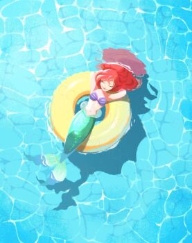 1girl afloat ariel_(disney) arms_behind_head bikini breasts closed_eyes closed_mouth commentary_request fins fish_tail full_body highres long_hair medium_breasts mermaid midriff monster_girl naco_oekaki navel red_hair shell shell_bikini smile solo swim_ring swimsuit tail the_little_mermaid_(disney)