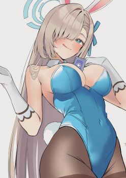 1girl animal_ears asuna_(blue_archive) asuna_(bunny)_(blue_archive) between_breasts blonde_hair blue_archive blue_eyes blue_leotard bow bowtie breasts card card_between_breasts cowboy_shot detached_collar fake_animal_ears gloves hair_over_one_eye halo highres large_breasts leotard long_hair mole mole_on_breast nakano_kura official_alternate_costume pantyhose playboy_bunny rabbit_ears smile strapless strapless_leotard white_gloves