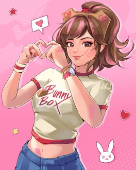 Rule 34 | 1girl, brown hair, cardboard, cardboard d.va, colored shadow, commentary, crop top, cropped shirt, d.va (overwatch), denim, facial mark, four-finger heart hands, gradient background, hands up, heart, heart hands, high ponytail, highres, jeans, looking at viewer, multicolored hair, navel, noush, overwatch, paint on body, paint on hands, pants, pink background, pink hair, pink lips, pink nails, pink streaks, pink theme, ponytail, shadow, short sleeves, signature, smile, solo, streaked hair