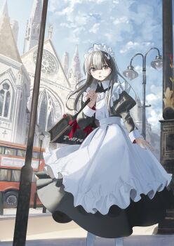 1girl apron bag black_dress blunt_bangs bus cathedral church cloud cloudy_sky collared_dress double-decker_bus dress feet_out_of_frame grey_eyes grey_hair hair_ornament lamppost long_hair long_sleeves looking_at_viewer maid maid_apron maid_headdress motor_vehicle open_mouth original outdoors puffy_sleeves rabbit_hair_ornament red_ribbon ribbon shii_(kairi-t-k0317) sky solo white_apron