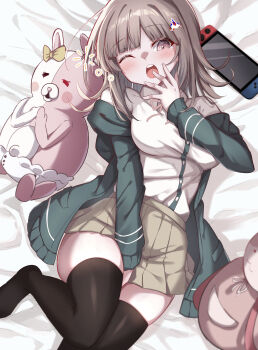 1girl absurdres animal_bag bag between_legs blush bow breasts brown_hair brown_skirt cat_bag collared_shirt commentary_request danganronpa_(series) danganronpa_2:_goodbye_despair ear_bow flipped_hair gabanborjarnon hair_ornament hand_between_own_legs handheld_game_console highres jacket long_sleeves looking_at_viewer medium_hair monomi_(danganronpa) nanami_chiaki neck_ribbon nintendo_switch open_clothes open_jacket pink_bag pink_eyes pink_ribbon pleated_skirt ribbon shirt skirt thighhighs two-tone_shirt white_shirt