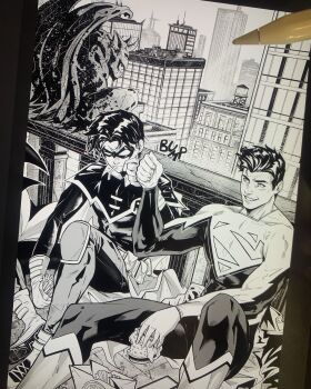 2boys black_hair building burger cape cityscape commentary damian_wayne dc_comics domino_mask english_commentary english_text eye_mask fist_bump food french_fries gargoyle gloves greyscale happy_valentine highres jonathan_kent looking_at_another mask monochrome multiple_boys outdoors robin_(dc) scenery sound_effects superboy superhero_costume travismercer15