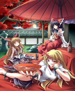 3girls alcohol autumn black_hair chain cup detached_sleeves female_focus fuyuwa_kotatsu hakurei_reimu horns hoshiguma_yuugi ibuki_suika japanese_clothes long_hair lying miko multiple_girls oil-paper_umbrella on_side red_eyes ribbon sakazuki sake single_horn sitting stone_lantern touhou umbrella