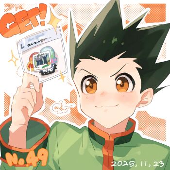 1boy :3 beer611gold blush brown_eyes closed_mouth dated gon_freecss green_hair green_jacket highres holding hunter_x_hunter jacket male_focus numbered outline polka_dot short_hair solo sparkling_eyes spiked_hair white_outline