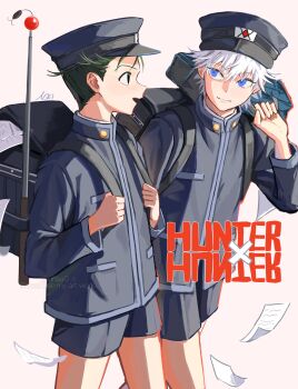 2boys alternate_costume backpack bag black_bag black_hat black_jacket black_shorts blue_eyes closed_mouth commentary_request copyright_name gon_freecss green_hair hat highres holding_strap hunter_x_hunter jacket killua_zoldyck korean_commentary looking_at_another male_focus multiple_boys nnaa0_o open_mouth short_hair shorts simple_background standing walking white_background white_hair