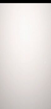 1girl animated animated_gif backlighting black_gloves black_jacket brown_hair clothing_cutout dust explosion multiple_expressions gloves goddess_of_victory:_nikke gun gun_sling hat highres jacket kim_hyung_tae leotard leotard_under_clothes long_hair looking_to_the_side official_art rapi_(nikke) simple_background solo sprite squatting thigh_cutout thighhighs very_long_hair weapon wide_hips