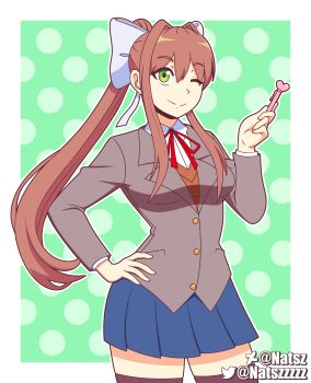 1girl absurdres artist_name blazer bow breasts brown_hair deviantart_logo deviantart_username doki_doki_literature_club doki_doki_literature_club_school_uniform green_eyes hair_bow hair_intakes hand_on_own_hip highres holding holding_pen jacket monika_(doki_doki_literature_club) natsz_(natszzzzz) one_eye_closed pen pleated_skirt polka_dot polka_dot_background ponytail ribbon school_uniform shirt skirt smile sweater thighhighs twitter_logo twitter_username zettai_ryouiki