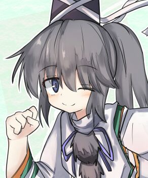 1girl ;) black_hat blush closed_mouth commentary_request green_background grey_hair hat long_hair looking_at_viewer mononobe_no_futo one_eye_closed outline pom_pom_(clothes) ponytail safupara_(crnsrd65) simple_background smile solo tate_eboshi touhou upper_body white_outline