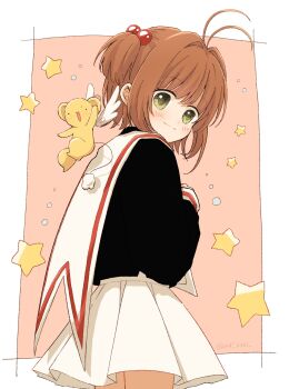 1girl antenna_hair black_shirt blush border brown_hair cardcaptor_sakura closed_mouth commentary cowboy_shot green_eyes hair_bobbles hair_ornament highres kero_(cardcaptor_sakura) kinomoto_sakura long_sleeves mizu_0401 one_side_up outside_border pink_background pleated_skirt sailor_collar school_uniform shirt short_hair simple_background skirt smile star_(symbol) tomoeda_elementary_school_uniform white_border white_sailor_collar white_skirt