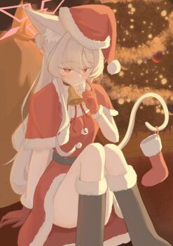 1girl akira_(blue_archive) alternate_costume animal_ear_fluff animal_ears bell blue_archive boots capelet cat_ears cat_girl cat_tail christmas christmas_tree colored_eyelashes dress gloves halo hat highres long_hair mole mole_under_eye neck_bell pink_halo red_boots red_capelet red_dress red_eyes red_gloves red_hat sack santa_costume santa_dress santa_hat silva_5656 sitting solo tail white_eyelashes white_hair