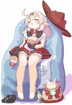 1girl ahoge barefoot bean_bag_chair blonde_hair dodoco_(genshin_impact) dress full_body genshin_impact hat highres holding inaririn klee_(blossoming_starlight)_(genshin_impact) klee_(genshin_impact) large_hat open_mouth pointy_ears red_dress red_hat saliva shoes signature simple_background sitting sleeping solo unworn_hat unworn_headwear unworn_shoes white_background