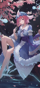 1girl absurdres barefoot blue_hat blue_kimono breasts cherry_blossoms closed_mouth commentary_request falling_petals folded_fan folding_fan foot_out_of_frame frilled_kimono frills ghost hand_fan hat highres holding holding_fan in_tree japanese_clothes jianjia kimono knee_up large_breasts long_sleeves looking_at_viewer moon night night_sky outdoors petals pink_hair pink_petals purple_eyes purple_sash saigyouji_yuyuko sash short_hair sitting sitting_in_tree sky smile solo touhou tree water wide_sleeves