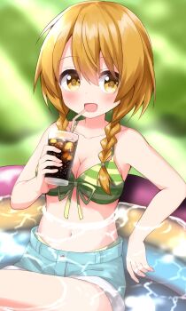 1girl :d bikini blue_shorts blurry blurry_background blush breasts cleavage collarbone commentary_request cowboy_shot cup drinking_glass drinking_straw green_bikini hair_between_eyes hand_up highres holding holding_cup long_hair looking_at_viewer medium_breasts natsuki_hinata navel open_mouth orange_hair partially_submerged pool ruu_(tksymkw) shorts sitting smile soda solo striped_bikini striped_clothes swimsuit tonari_no_kyuuketsuki-san water yellow_eyes