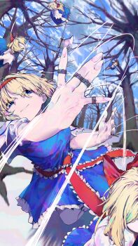 1girl alice_margatroid blonde_hair blue_dress blue_eyes doll dress forest frills highres magic nature outdoors puppet_strings red_ribbon ribbon shanghai_doll short_hair snow snowing touhou yuara