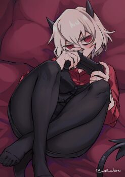 1girl black_horns black_pantyhose black_tail black_vest commentary_request controller crossed_legs demon_girl demon_horns demon_tail from_above game_controller hair_between_eyes helltaker highres holding holding_controller holding_game_controller horns looking_at_viewer lying malina_(helltaker) noah_(tettsui-sole) on_back pantyhose red_eyes red_shirt shirt short_hair solo tail twitter_username vest waistcoat white_hair