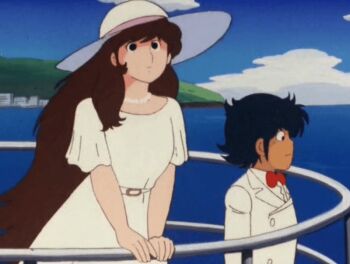 1982 1boy 1girl 80s animated animated_gif anime_screenshot aoba_shunsuke asaoka_natsumi black_eyes black_hair blue_sky bow breasts brown_hair city cleavage cloud dress eyelashes formal_clothes hat height_difference jewelry long_hair looking_out lowres necklace necktie ocean oldschool outdoors pearl_necklace red_bow retro_artstyle size_difference sky small_male smile standing suit sun_hat tagme tall_female the_kabocha_wine very_long_hair white_dress white_suit wind