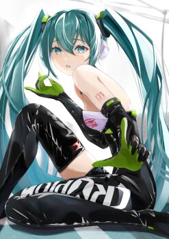 1girl aqua_eyes aqua_hair arm_tattoo black_bodysuit black_boots black_gloves bodysuit boots breasts commentary elbow_gloves from_side gloves goodsmile_company goodsmile_racing green_gloves hair_between_eyes hatsune_miku highres hxk4_n long_hair looking_at_viewer number_tattoo open_mouth racing_miku racing_miku_(2022) sideboob simple_background single_thigh_boot sitting small_breasts solo tattoo thigh_boots triangle_mouth twintails two-tone_gloves very_long_hair vocaloid white_background