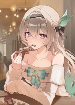 1girl absurdres alternate_costume bare_shoulders black_ribbon blurry blurry_background bow brown_sweater collarbone commentary eating elbows_on_table firefly_(honkai:_star_rail) food gingerbread_cookie gradient_hair green_bow grey_hair h0kori hair_between_eyes hair_intakes hair_ornament hair_ribbon hashtag-only_commentary highres holding holding_food honkai:_star_rail honkai_(series) indoors kafka_(honkai:_star_rail) long_hair long_sleeves looking_at_viewer multicolored_hair off-shoulder_sweater off_shoulder purple_eyes ribbon solo sweater upper_body