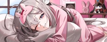 1girl alarm_clock barefoot black_ribbon character_doll clock commentary_request doll firefly_(honkai:_star_rail) green_pupils grey_hair hair_between_eyes hair_intakes hair_ornament hair_ribbon highres honkai:_star_rail honkai_(series) korean_commentary long_hair multicolored_eyes on2_(on2dhsxn) on_bed one_eye_closed open_mouth pajamas pink_pajamas pom-pom_(honkai:_star_rail) ribbon smile solo teeth unworn_blindfold