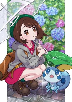 1girl brown_bag cable_knit cardigan dress floral_background gen_8_pokemon gloria_(pokemon) green_hat green_socks grey_cardigan hat highres holding holding_umbrella hood hooded_cardigan leaf nintendo pink_dress plaid_clothes plaid_socks pokemon pokemon_(creature) pokemon_swsh rain sobble socks tam_o'_shanter umbrella yuu_(jgvj7873)