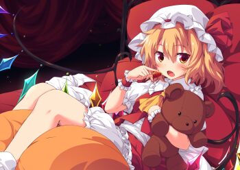 1girl absurdres blonde_hair bloomers blush bow collared_shirt commentary crystal fang feet_out_of_frame flandre_scarlet food frilled_shirt_collar frilled_skirt frills fruit hair_between_eyes hat hat_bow highres holding holding_food holding_fruit hugging_object lying mob_cap on_back one_side_up open_mouth red_bow red_eyes red_skirt red_vest shirt skirt socks solo strawberry stuffed_animal stuffed_toy teddy_bear touhou ugume underwear vest white_bloomers white_hat white_shirt white_socks wings