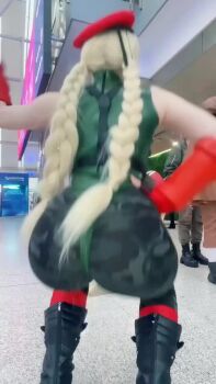 1girl animated ass ass_focus bare_shoulders blonde_hair boots cammy_white cammy_white_(cosplay) cosplay fingerless_gloves fortnite from_behind gloves hat head_out_of_frame highres leotard long_hair real_life sleeveless squatting street_fighter tagme tearastar thong_leotard video