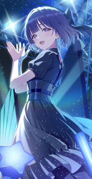 1girl begrazia_(idolmaster) black_bow black_corset black_dress blue_eyes blue_hair blush bow concert corset dress gakuen_idolmaster glowstick hair_bow hands_up hataya_misuzu highres idol idolmaster kitano_yukito looking_at_viewer mole mole_under_eye official_alternate_costume open_mouth puffy_short_sleeves puffy_sleeves short_hair short_sleeves smile stage stage_lights star_(symbol)