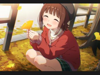 1girl ^_^ amami_haruka beret black_hat blurry blurry_background blush brown_cardigan brown_hair cardigan closed_eyes commentary facing_viewer ginkgo_leaf green_skirt gyorui_(katsuwo_drawing) hat highres holding holding_leaf idolmaster idolmaster_(classic) jewelry leaf letterboxed long_sleeves necklace open_mouth outdoors short_hair sidelocks signature skirt smile solo squatting sweater symbol-only_commentary turtleneck turtleneck_sweater