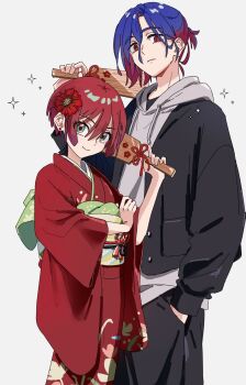 1boy 1girl amate_yuzuriha aqua_eyes blue_hair blush closed_mouth commentary_request couple gundam gundam_gquuuuuux hetero highres holding holding_paddle hood hoodie jacket japanese_clothes kimono long_sleeves looking_at_viewer multicolored_hair new_year o6nuqm obi paddle pants print_kimono red_eyes red_hair red_kimono sash shirt short_hair shuji_ito simple_background smile two-tone_hair white_background wide_sleeves