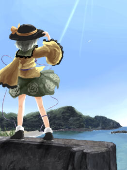 1girl black_hat black_shoes blue_sky commentary_request contrast_collar green_hair hand_up hat hat_ribbon heripantomorrow highres komeiji_koishi long_sleeves outdoors ribbon shirt shoes sky socks solo standing third_eye touhou white_socks wide_sleeves yellow_ribbon yellow_shirt