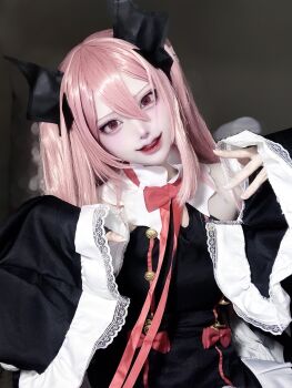 1girl absurdres aegyo_sal black_bow black_dress bow cosplay_photo double-parted_bangs dress eyelashes grin hair_between_eyes hair_bow hands_up head_tilt highres krul_tepes lace-trimmed_sleeves lace_trim long_hair long_sleeves looking_at_viewer neck_ribbon owari_no_seraph photo_(medium) pink_hair red_eyes red_lips red_ribbon ribbon sleeves_past_wrists smile solo two_side_up upper_body vv_yxx_(cosplayer) wide_sleeves